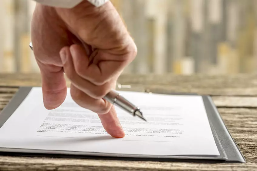 Family meeting with legal advisor, showing when a Will is crucial—highlighting Trusted Will Writing Bushey for essential life planning.